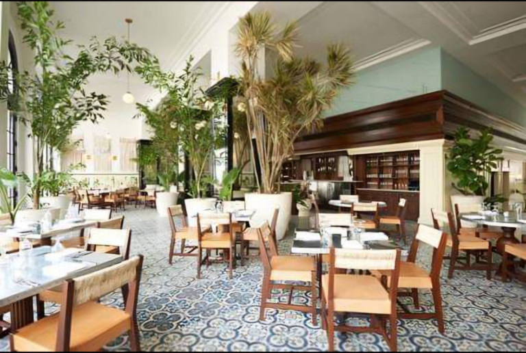 Concrete planters integrated into modern restaurant interior design